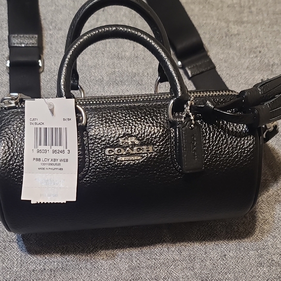 Coach Handbags - Coach Black Pebbled Leather Barrel Bag